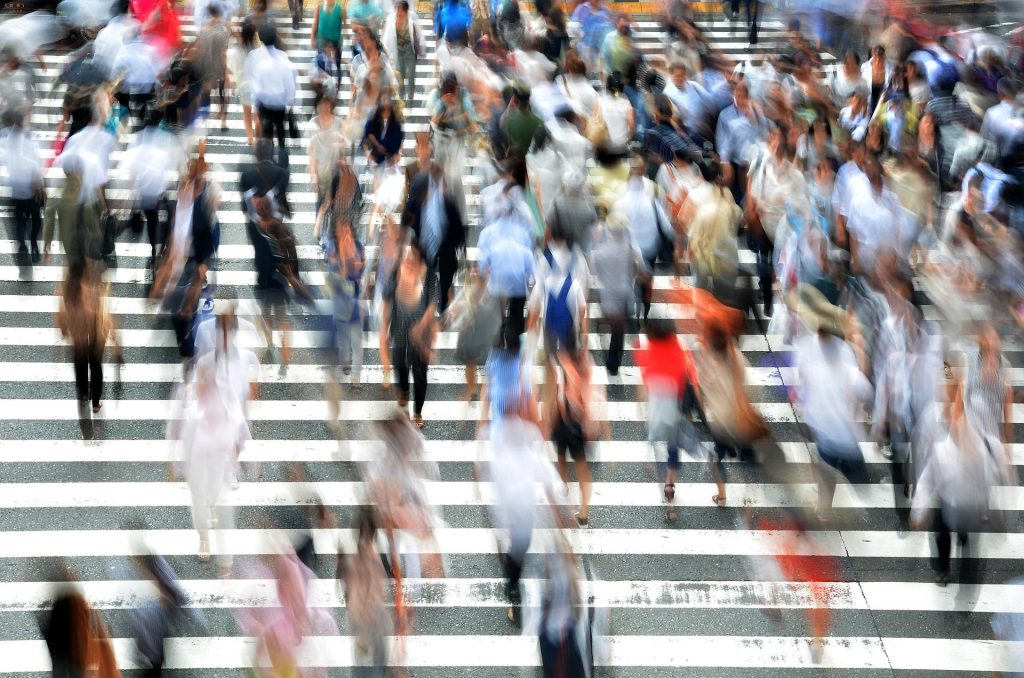 People walking across street
