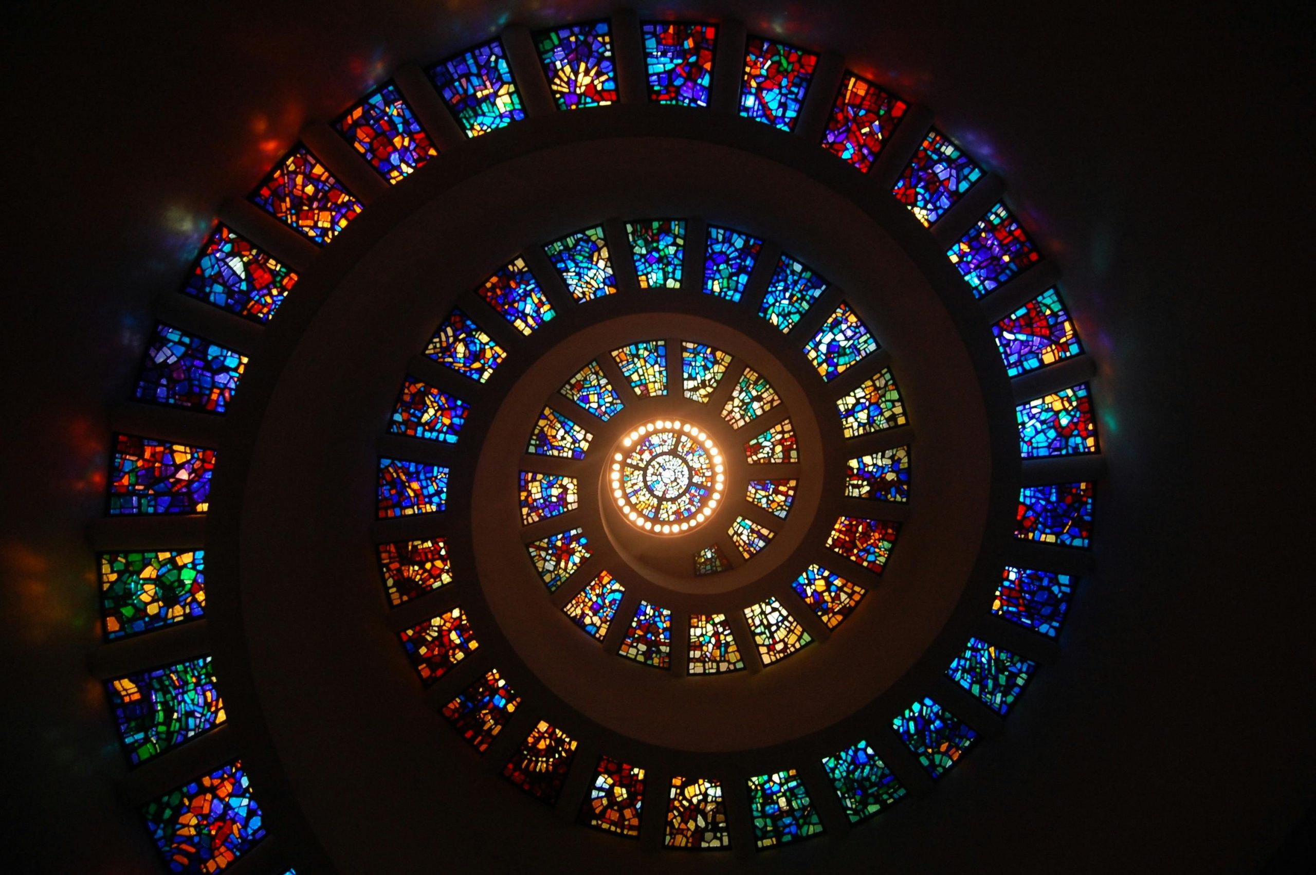 stained glass windows arranged in a spiral